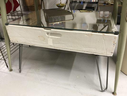 Early 1900's bread box turned into a side table with a glass top.