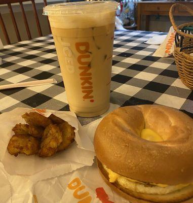 Medium iced coffee with cream, hash browns, sausage, egg & cheese on a plain bagel...