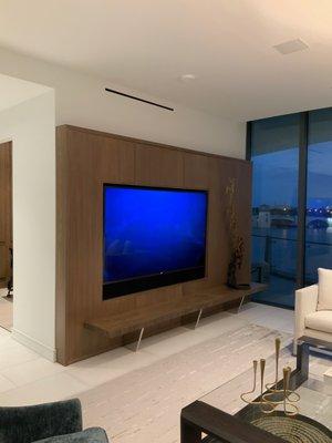 WML Custom rift White Oak media wall panel with TV niche and shelf / seat