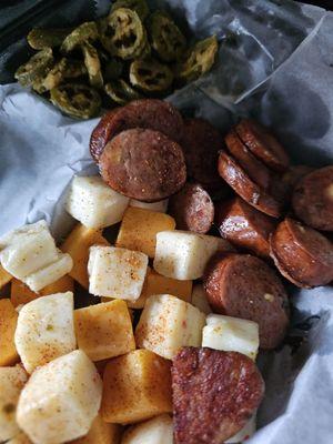 Sausage and cheese with fried jalapeños