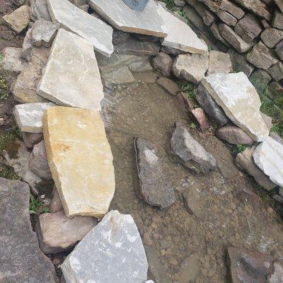 Reused existing rocks and new flagstone pieces to make 2 separate areas.