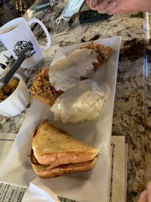 Hand breaded chicken fried steak, mashed potatoes and fried okra.