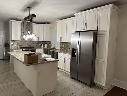 Another happy client! Dark brown cabinets painted white (Montclair, NJ)