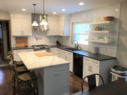 white everywhere... cambria matte countertops, lots of tile, chic