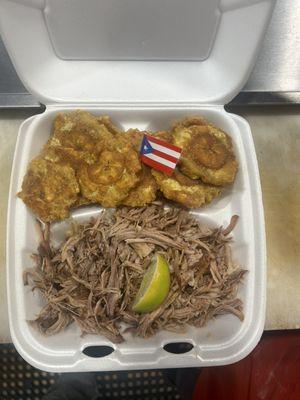 Slow roasted pork shoulder with fried green plantain