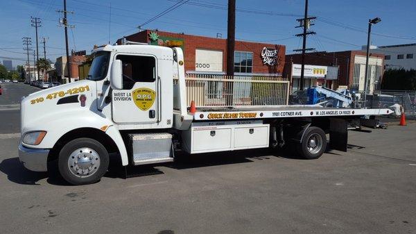 Our fleet of flatbeds can get down low enough to handle the lowest vehicles.