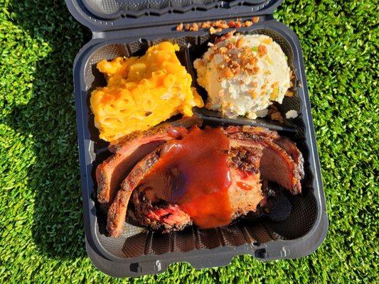 brisket with mac n' cheese and loaded potato salad