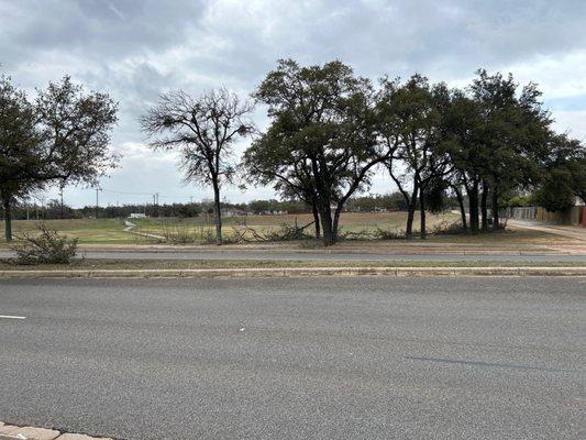 Large water retention area directly across the street from the park