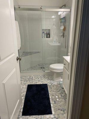 New shower, new floor, new door, new paint!