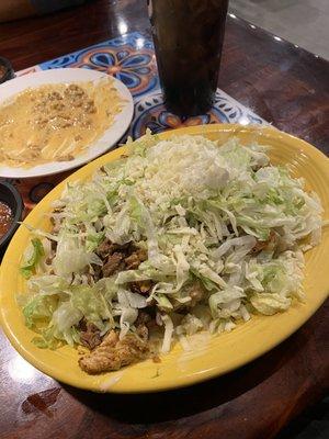 Fajita potato with steak and grilled chicken