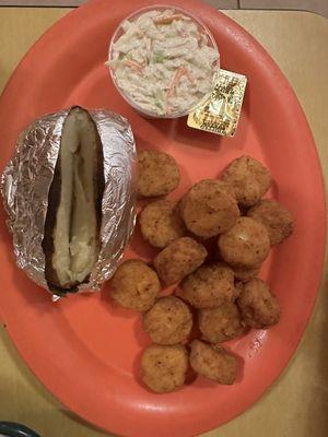 Scallops, coleslaw and baked potato