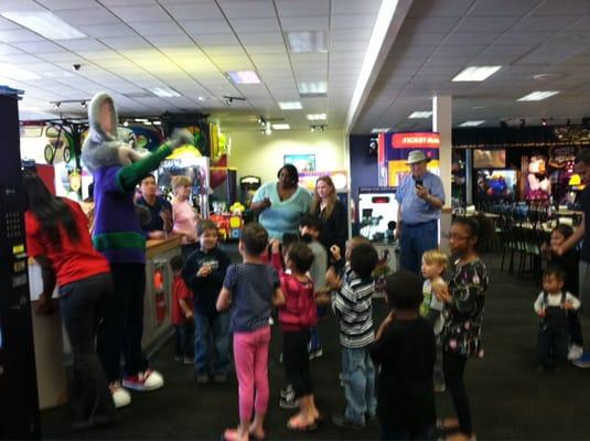 Chuck E Cheese mascot have out free tickets...the kids went crazy!