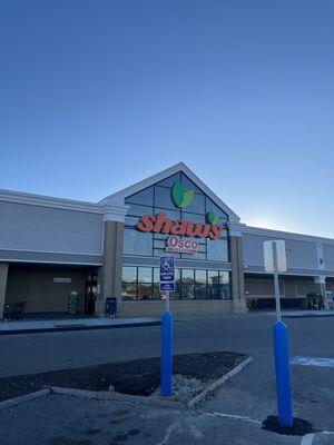 Shaws Pharmacy is to the right of the building.