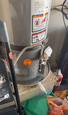 Old leaking water heater tank