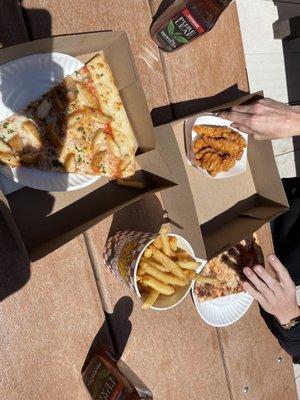 Chicken parm slice, fries, chicken tenders, bacon slice