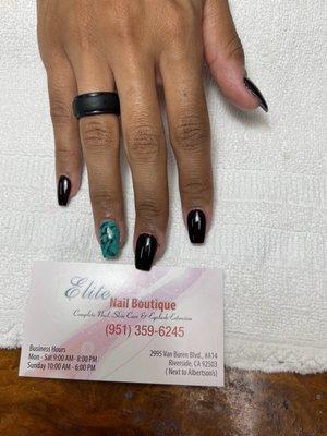 Marble nails are done by elite nails boutique