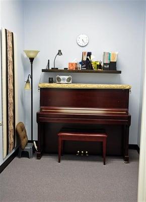 We use real acoustic pianos for lessons in our studio.