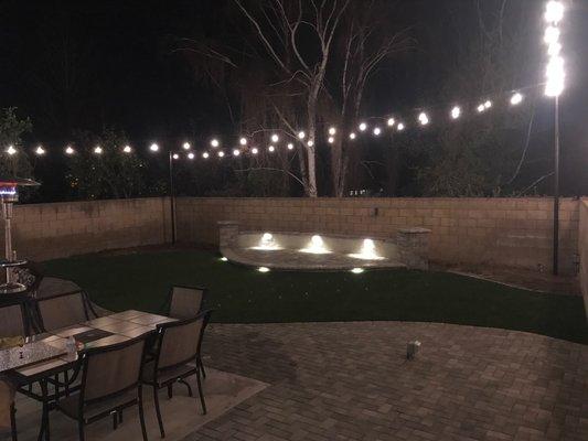 Backyard Edison string lights with step accent lights. Remotely controlled.