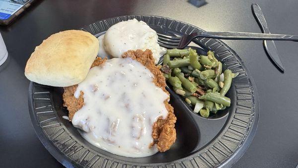 Chicken fried chicken, mashed potatoes and gravy with green beans