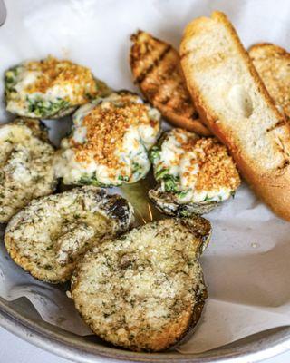 Savor the irresistible flavors of our signature chargrilled oysters!