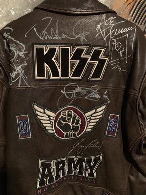 Kiss Army jacket with band signatures that was in a fire.  Saved by Classic Cleaners!