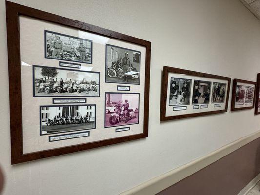 Historical police/city photos on wall