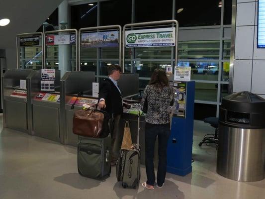 The GO Express Travel Airport booth in the Ground Transportation Center.