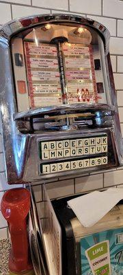 Old time jukebox at tables