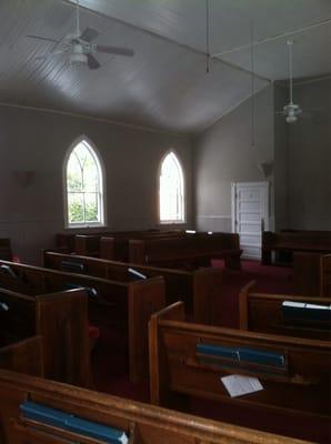 view of worship space facing rear.