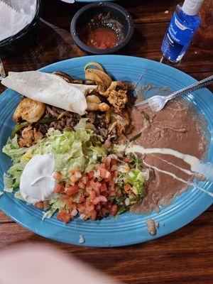 Lunch size Texas Fajita. Chicken, beef and shrimp. Loved it.