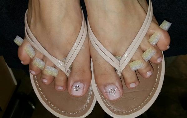 Classy pearl and diamond pedi done by Cassie