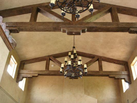 Faux wood beams, sand finish ceiling.