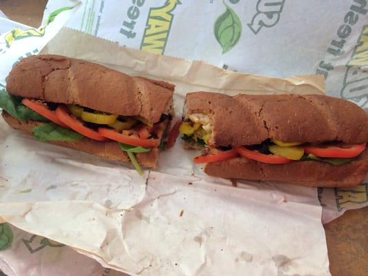 My go to: Oven Roasted Chicken on wheat with marinara sauce, spinach, tomatoes, black olives, & banana peppers.