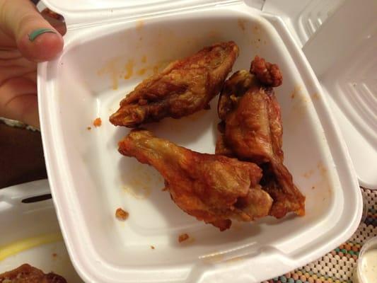 Dried out nasty flavorless, no sauce wings.