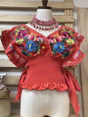 This was really cute. Would make for a great summer/festival ready blouse.