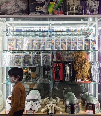 old toys and collectibles in themed displays, all for sale