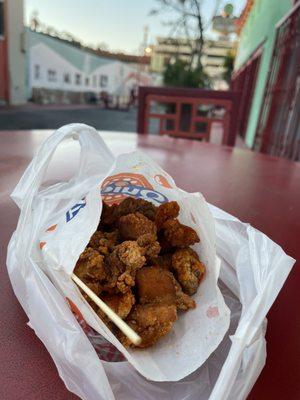 Some good old popcorn chicken. They don't add the basil leaf anymore :(