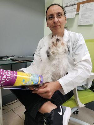 Lupita is in for some reading with her Vet Dr. Delbene