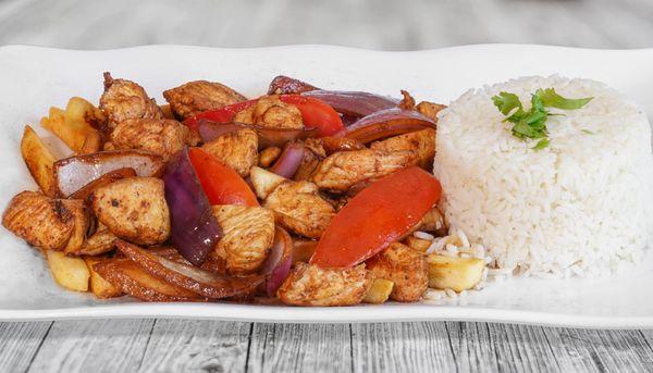 Marinated chicken breast, sautéed onions and tomatoes, garlic with rice, pollo saltado