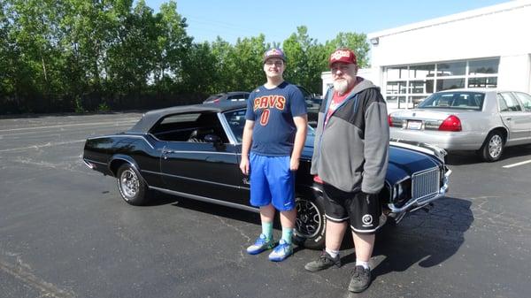 The Black Beauty...1972 Oldsmobile Cutlass convertible in triple black. Duane is a VERY happy camper.