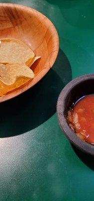 Chips and salsa. The salsa slightly hot, but too watery. Merely ok.