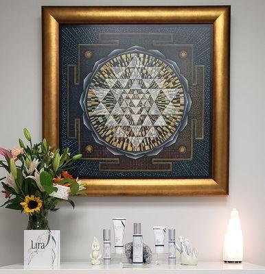 Sri Yantra by artist Aspen Moon hanging in treatment room.