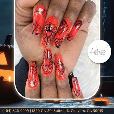 Get ready to spin a web of style with our stunning red spider nail design! Perfect for those who dare to stand out.