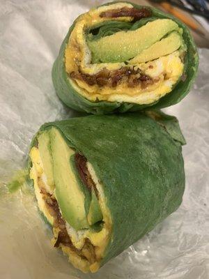 Bacon, Egg and Cheese Breakfast Sandwich, in spinach wrap (extra $2...don't get the spinach wrap!) + avocado