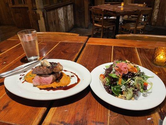 NY strip, perfectly seasoned and mixed green salad