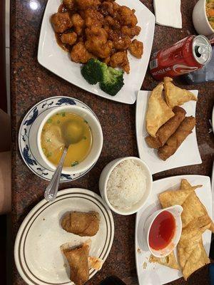 Orange Chicken, Wonton Soup, 8 Piece Crab Puff, 1 Piece Egg Roll