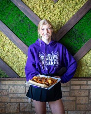 Our Friendly staff enjoy our Cajun Cheesesteak Po'boy!