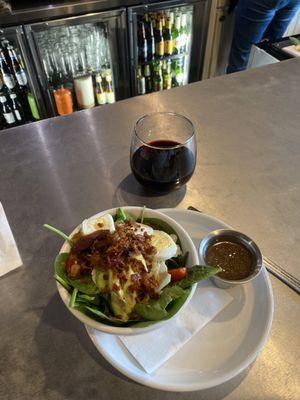 Spinach salad and a glass of Merlot.