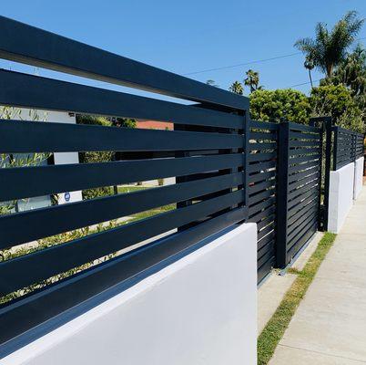 Horizontal steel fence, telescope sliding & pedestrian gate all powder coating.
Venice, CA 90291