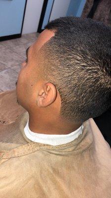 A bald taper Gabriel the Barber did